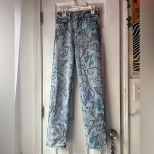 target jeans. graffiti print worn once super stretchy and comfortable